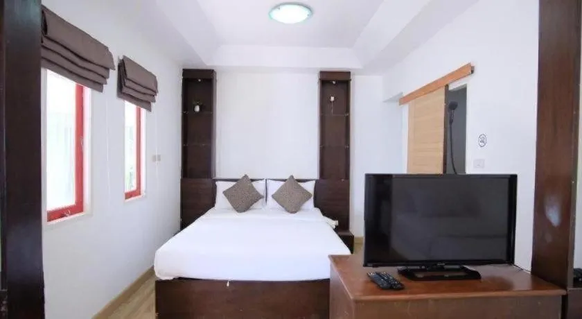 Bed in Sawasdee Coco Resort