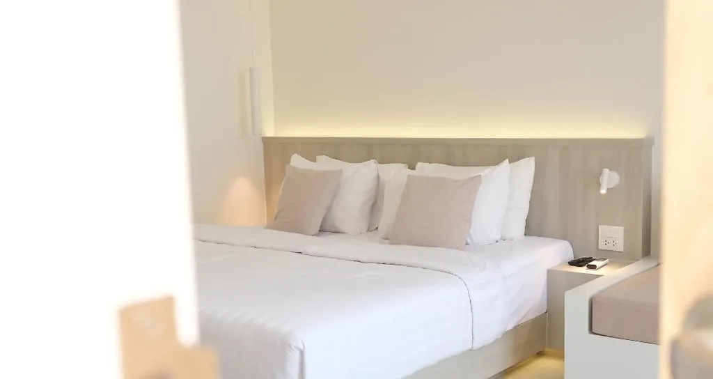Bed in Sawasdee Coco Resort