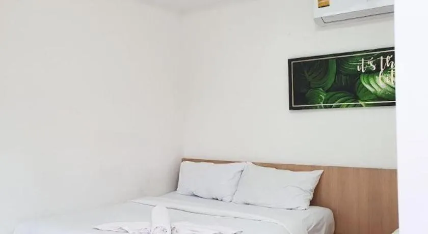 Bed in Sawasdee Coco Resort