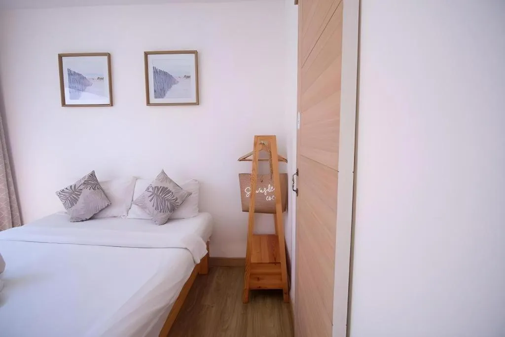 Bed in Sawasdee Coco Resort