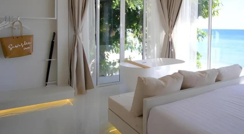 Bed in Sawasdee Coco Resort