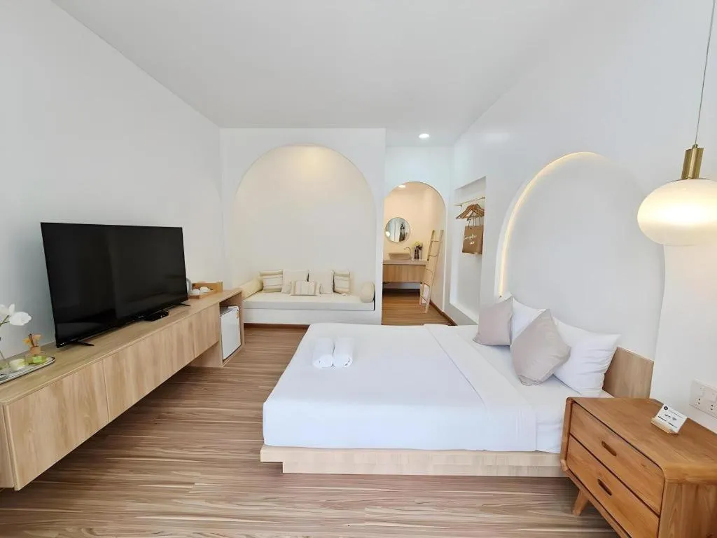 Bed in Sawasdee Coco Resort