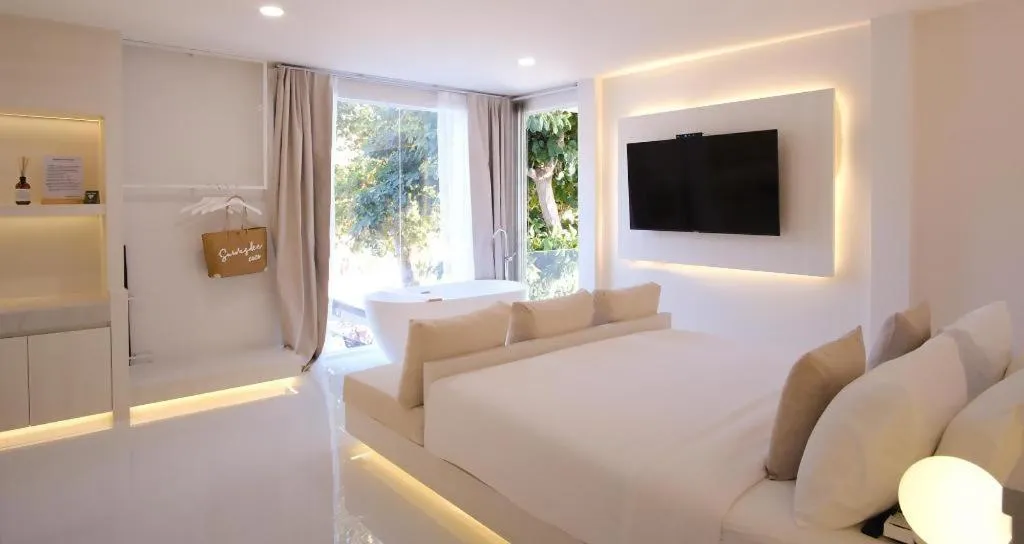 Bed in Sawasdee Coco Resort