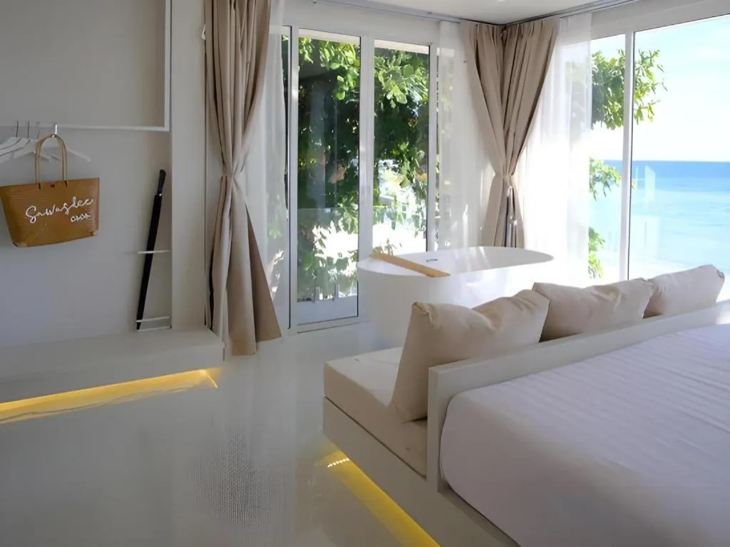 Bed in Sawasdee Coco Resort