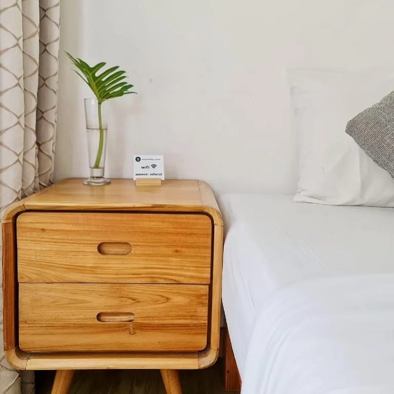 Bed in Sawasdee Coco Resort