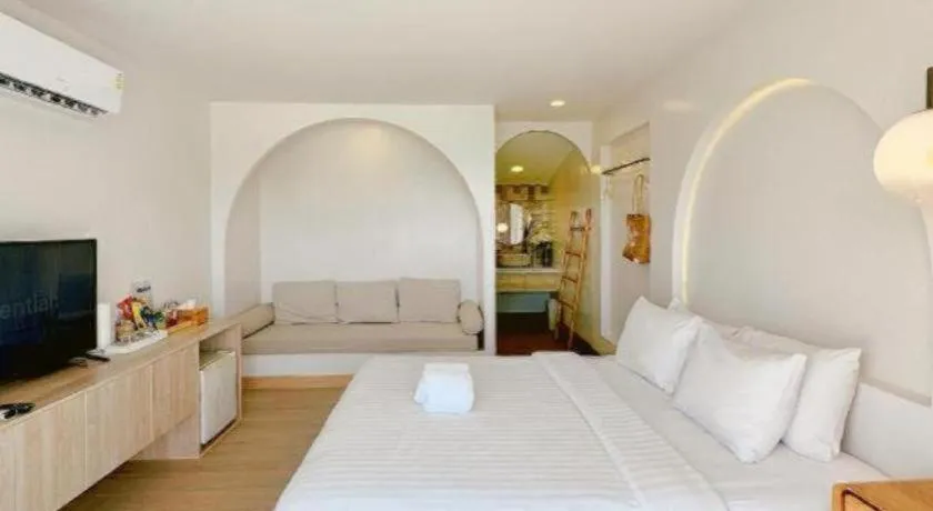 Bed in Sawasdee Coco Resort