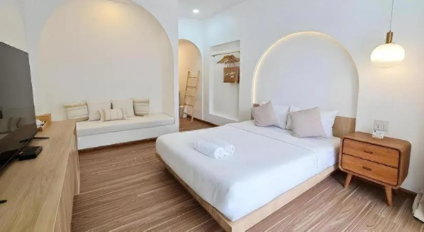 Bed in Sawasdee Coco Resort