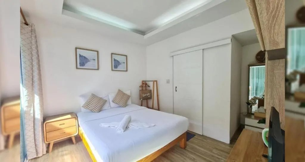 Bed in Sawasdee Coco Resort