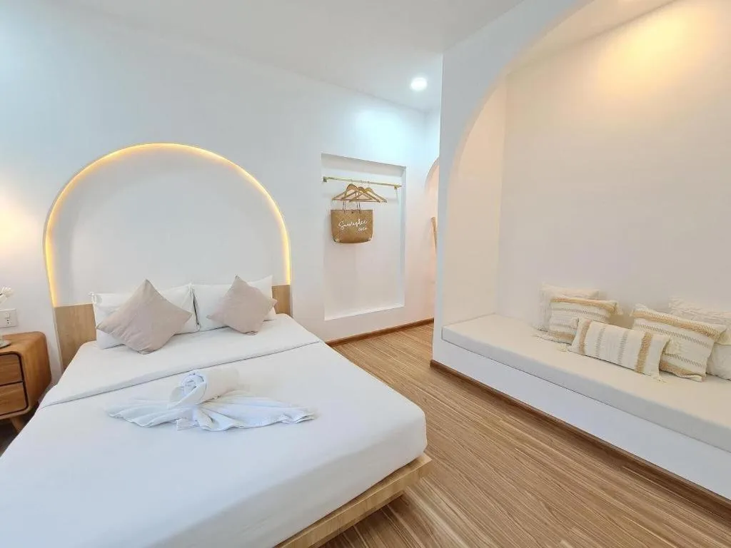 Bed in Sawasdee Coco Resort