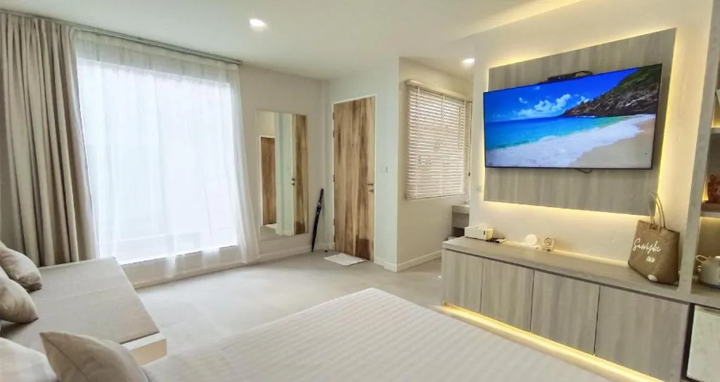 Bed in Sawasdee Coco Resort