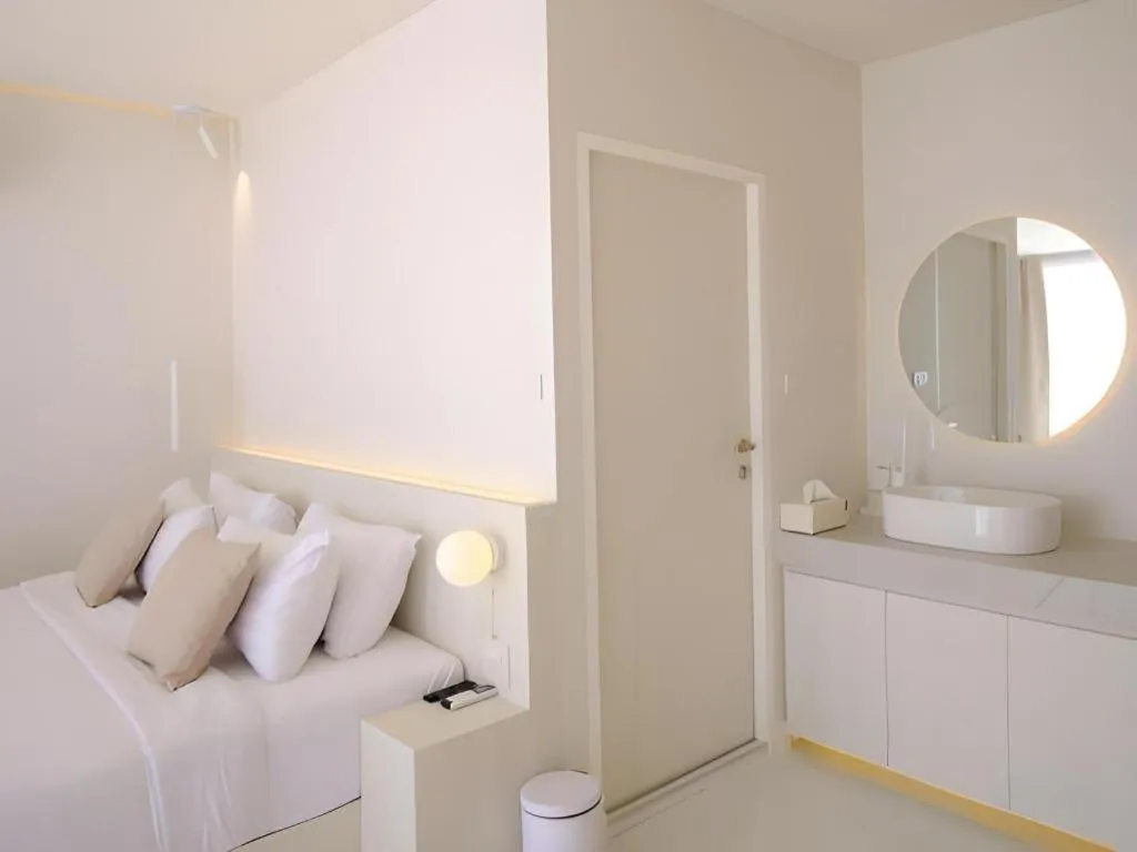 Bed in Sawasdee Coco Resort