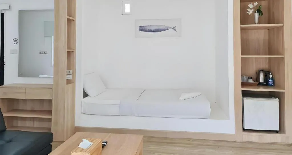 Bed in Sawasdee Coco Resort