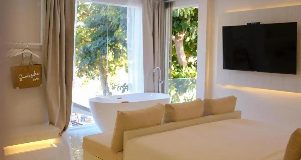 Bed in Sawasdee Coco Resort