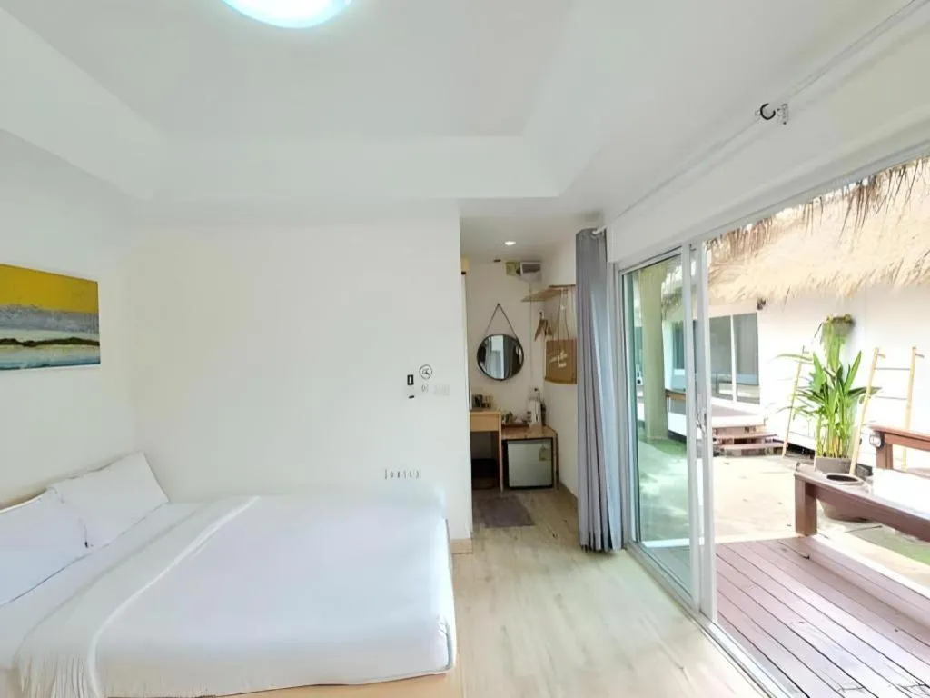 Bed in Sawasdee Coco Resort