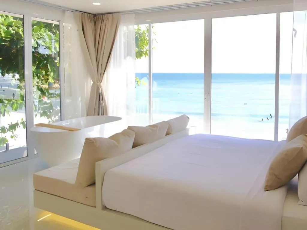 Bed in Sawasdee Coco Resort