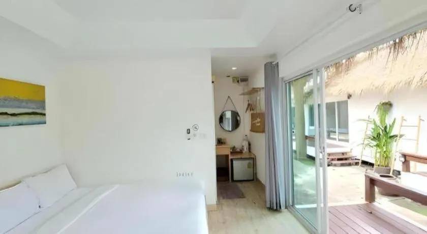 Bed in Sawasdee Coco Resort