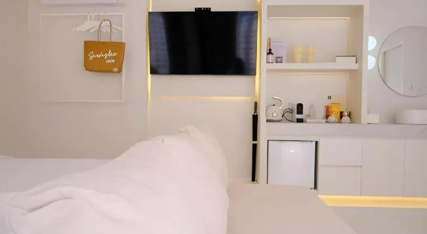 Bed in Sawasdee Coco Resort