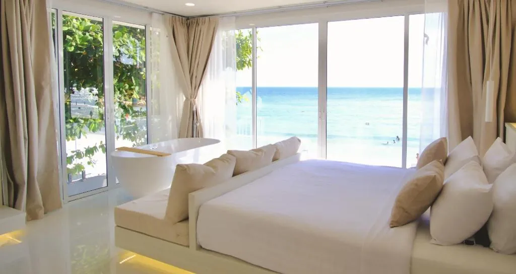 Bed in Sawasdee Coco Resort