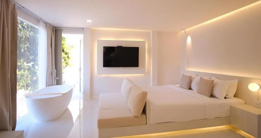 Bed in Sawasdee Coco Resort