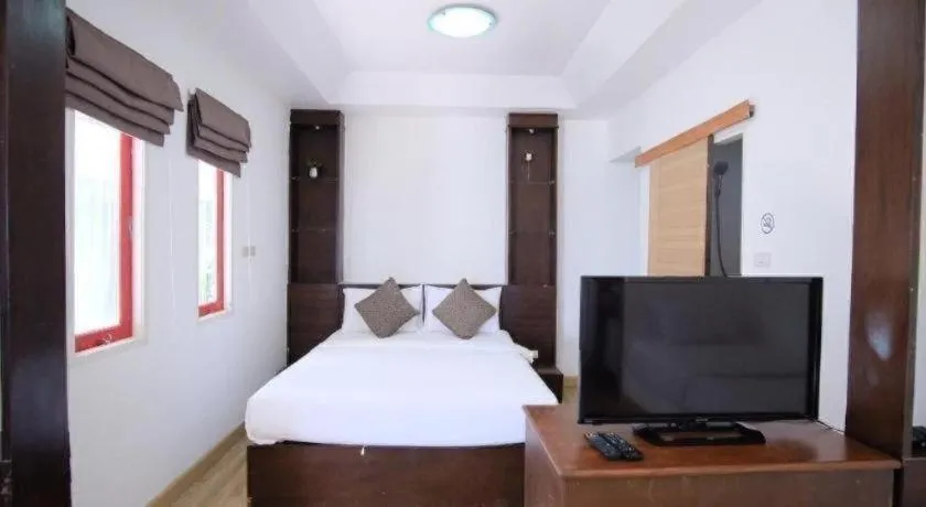 Bed in Sawasdee Coco Resort