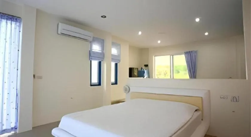 Bed in Anavilla Tangke Resort