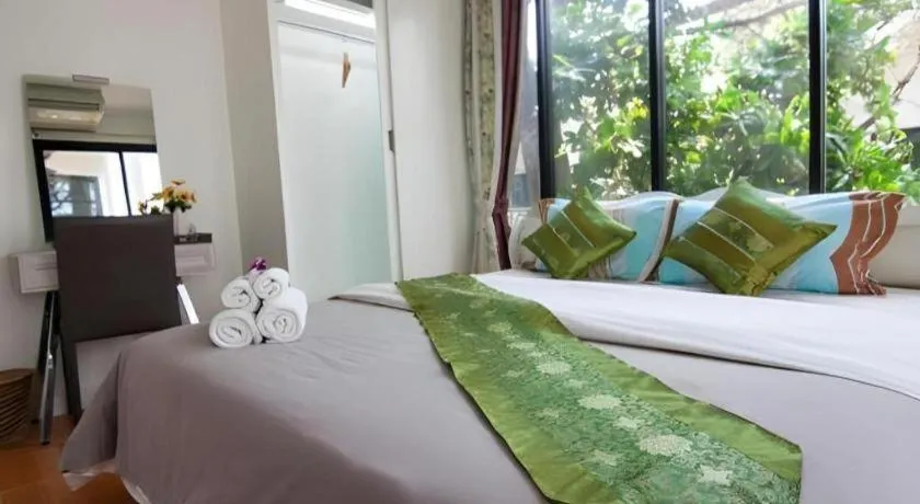 Bed in Chayada Garden House and Resort Hotel