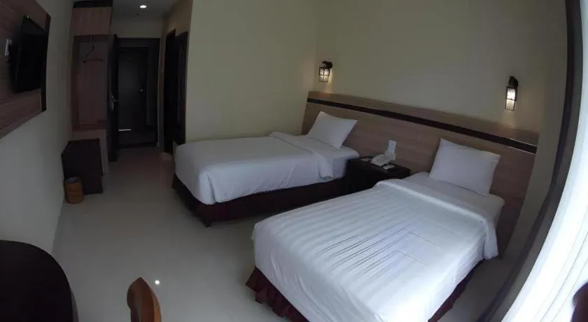 Bed in Puri Indah Hotel