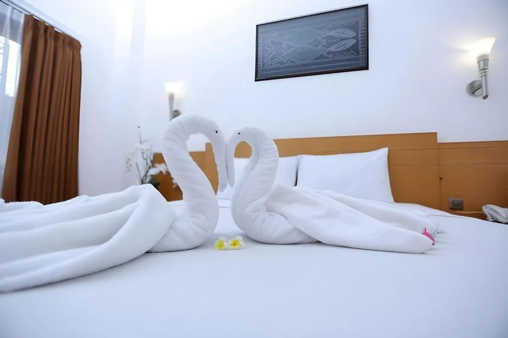 Bed in Puri Indah Hotel