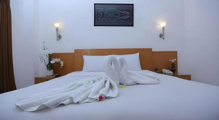 Bed in Puri Indah Hotel