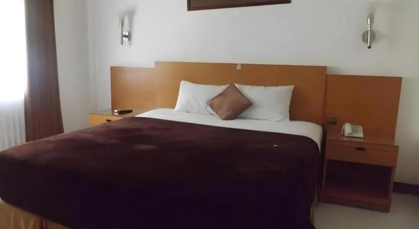 Bed in Puri Indah Hotel