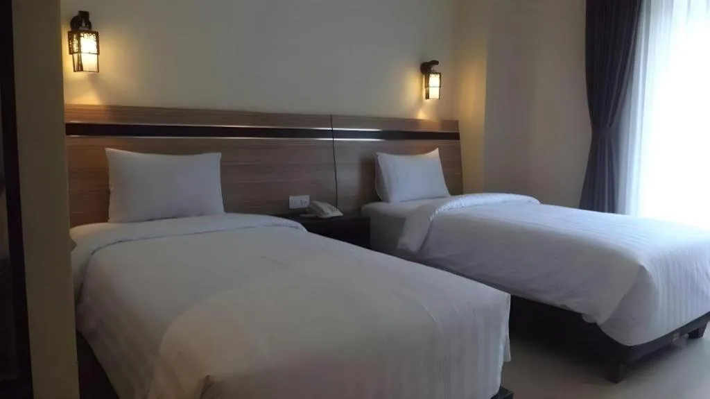 Bed in Puri Indah Hotel