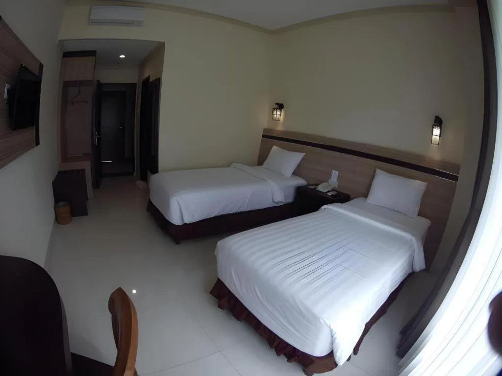 Bed in Puri Indah Hotel