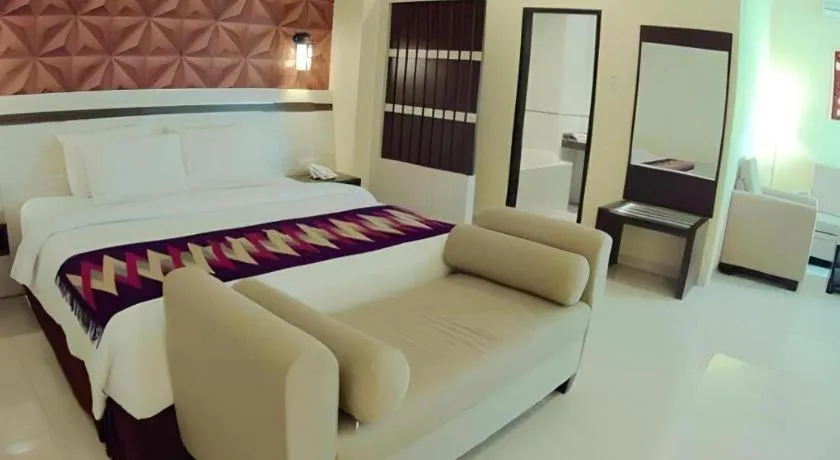 Bed in Puri Indah Hotel