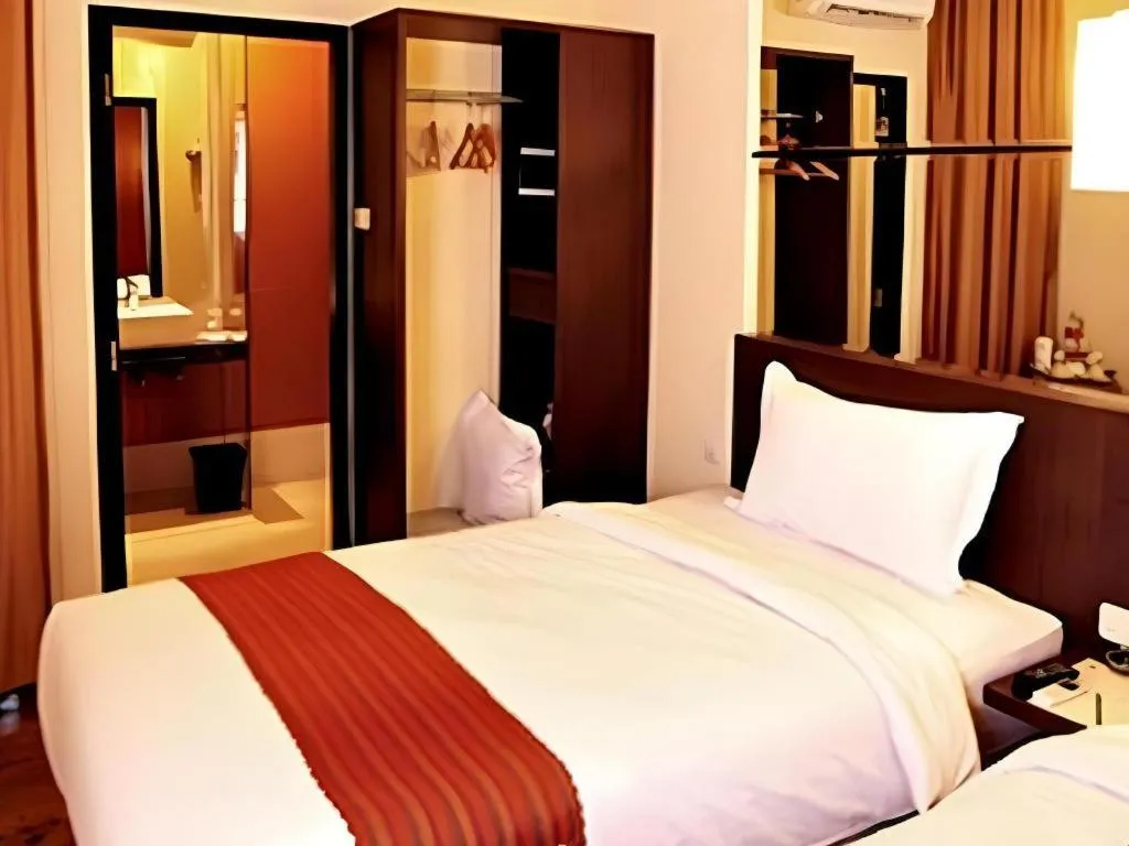 Bed in Savali Hotel