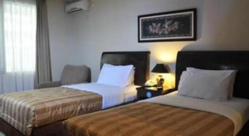 Bed in Sriwijaya Hotel
