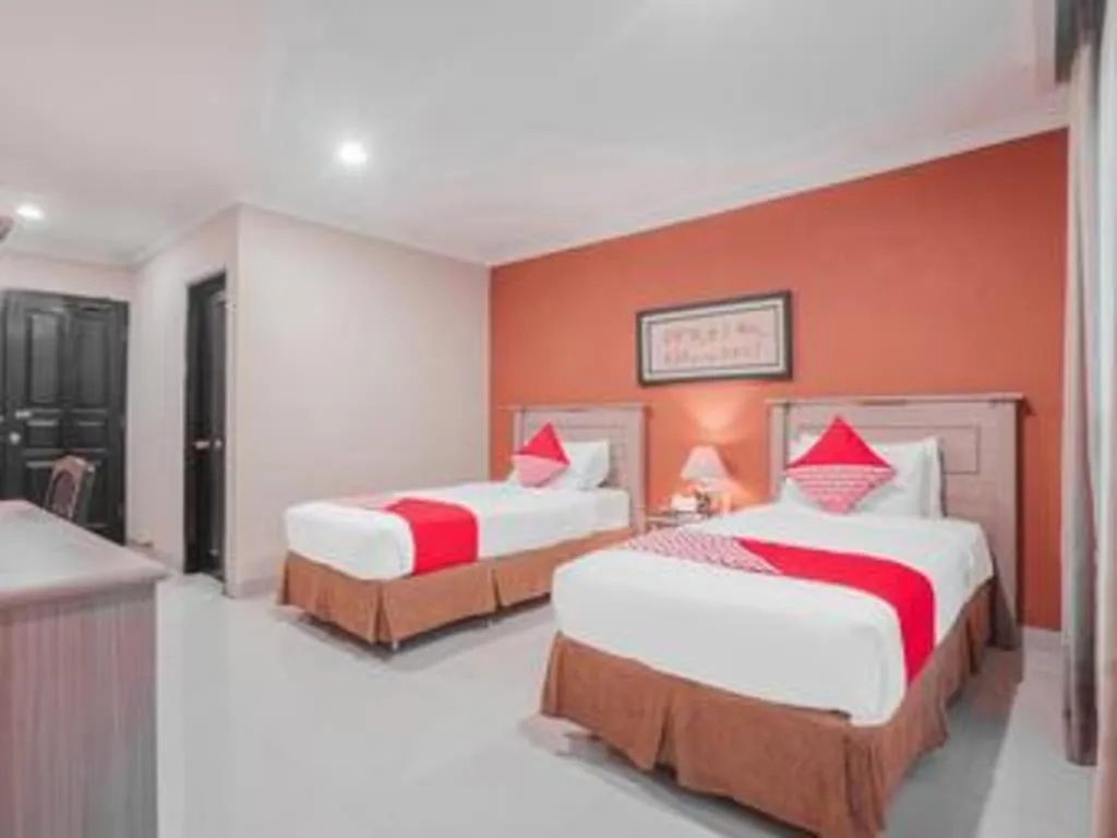 Bed in Sriwijaya Hotel