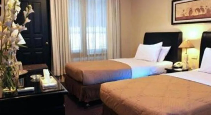 Bed in Sriwijaya Hotel