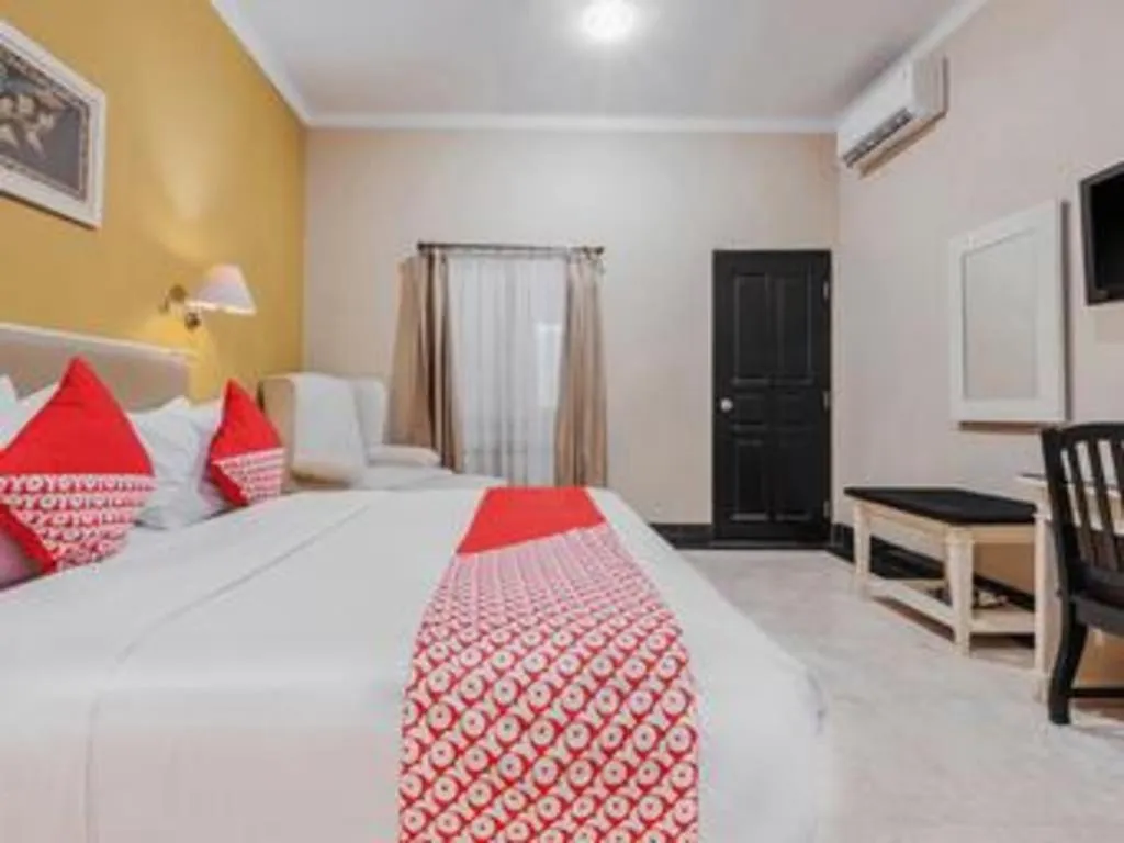 Bed in Sriwijaya Hotel