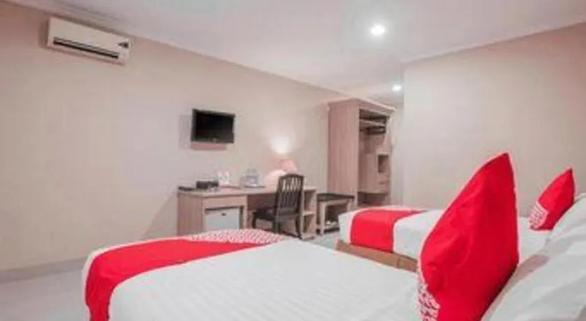 Bed in Sriwijaya Hotel