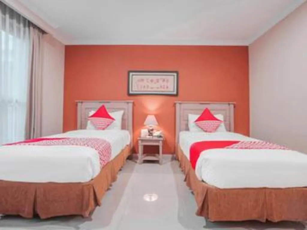 Bed in Sriwijaya Hotel