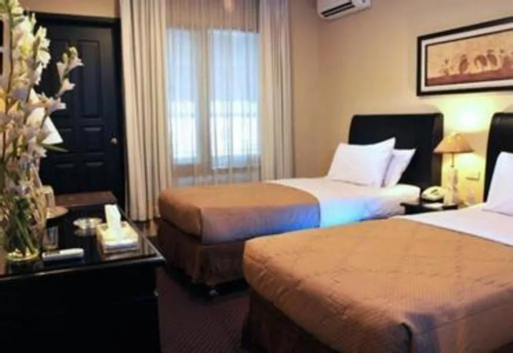 Bed in Sriwijaya Hotel