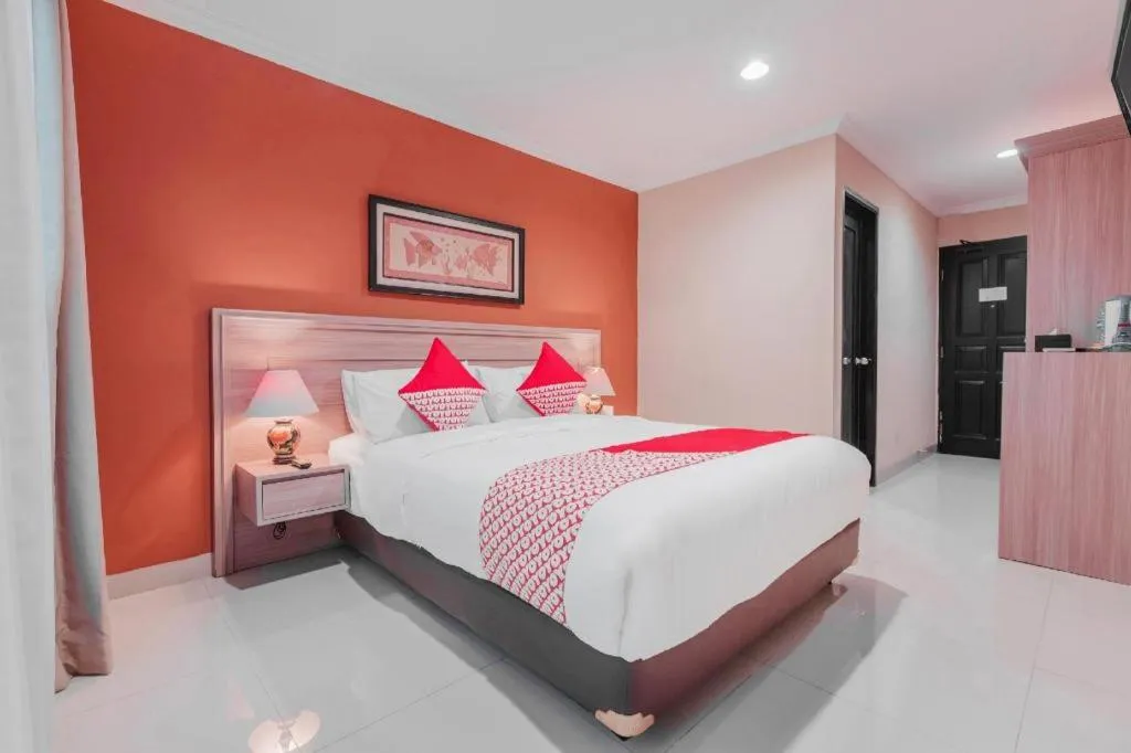 Bed in Sriwijaya Hotel