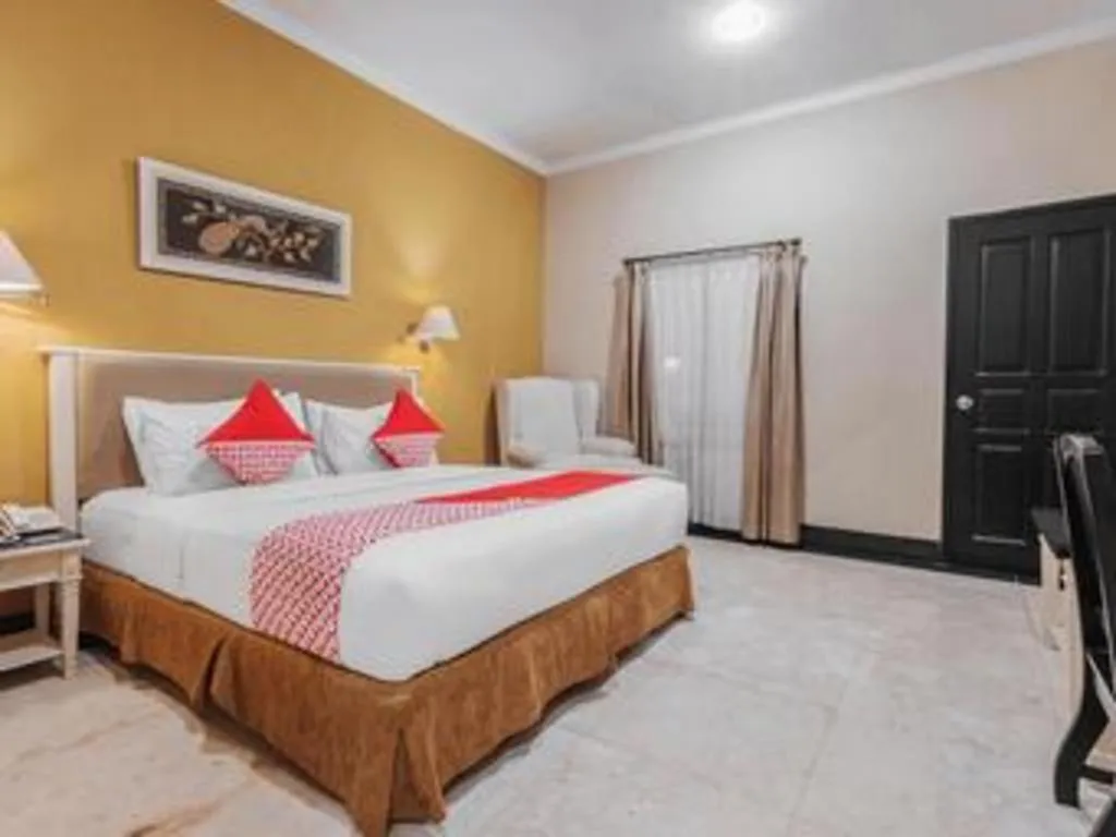 Bed in Sriwijaya Hotel