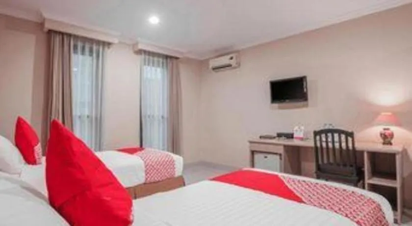 Bed in Sriwijaya Hotel