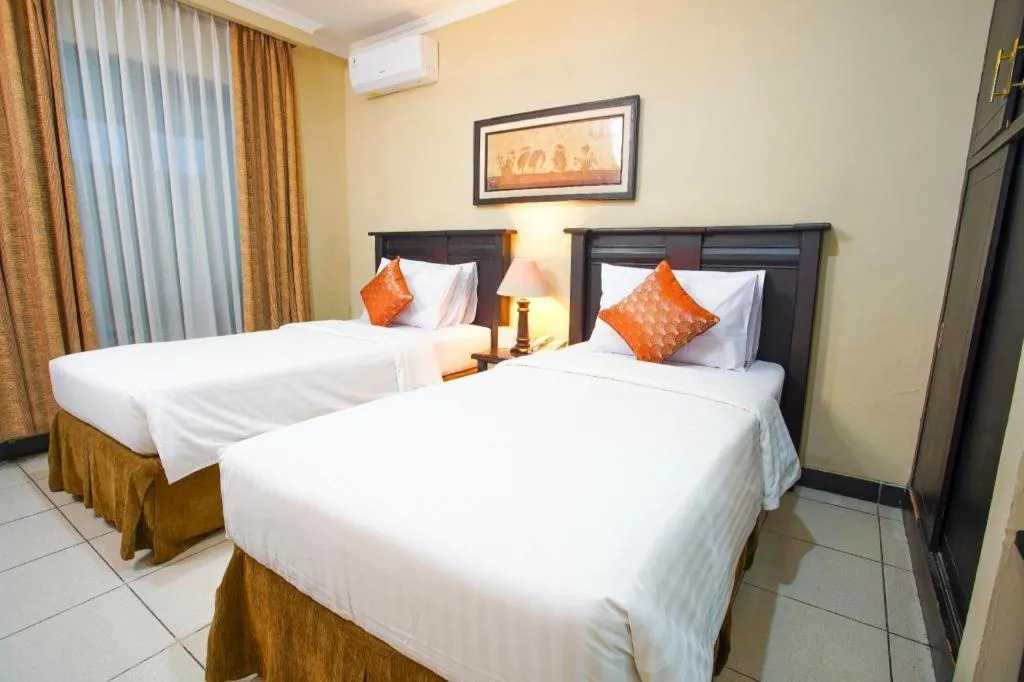 Bed in Sriwijaya Hotel