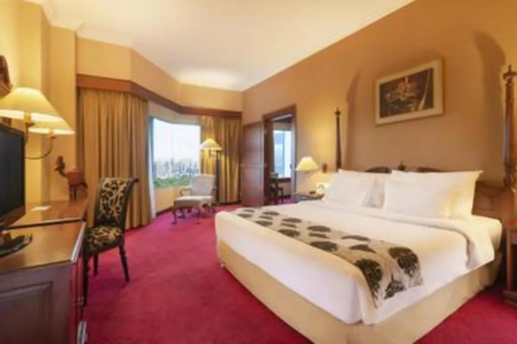 Bed in Blue Sky Hotel