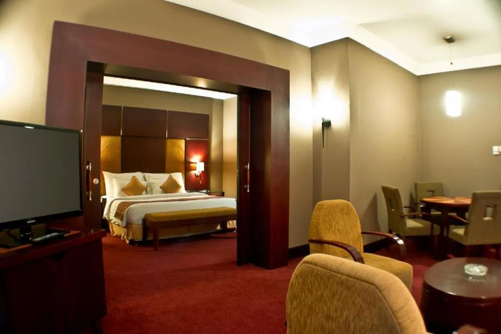 Bed in Blue Sky Hotel