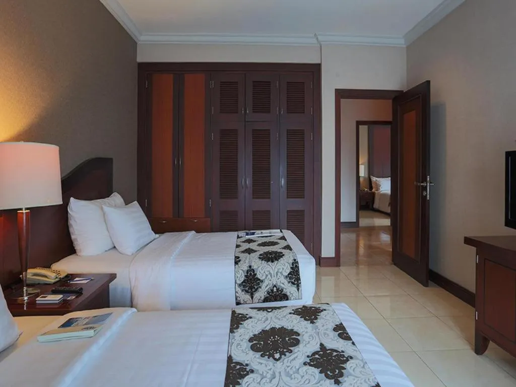 Bed in Blue Sky Hotel