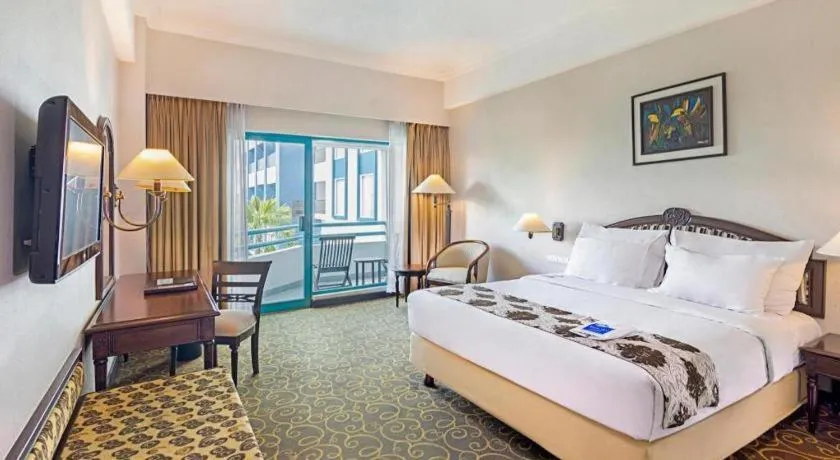 Bed in Blue Sky Hotel