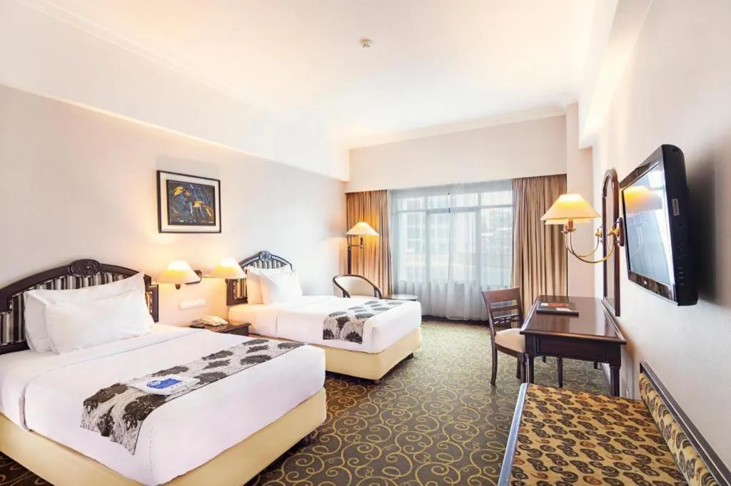 Bed in Blue Sky Hotel